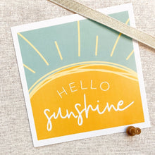 Load image into Gallery viewer, A cheerful greeting card titled "Hello Sunshine" from the "Any Occasion" gift box. The set also includes bright Ray of Sunshine Lemondrops, a charming faux succulent, and a soothing soy candle, perfect for brightening someone's day