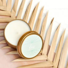 Load image into Gallery viewer, A hand-poured soy candle titled "Glow" from the "Any Occasion" gift box. The set also includes a cheerful greeting card with the message "Hello Sunshine," vibrant Ray of Sunshine Lemondrops, and a charming faux succulent, perfect for brightening any day