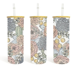 Elevate every sip with our delightful 25 oz glass tumbler, featuring a whimsical hand-drawn floral print. Perfect for anyone who loves to add a splash of fun to their drinks, this high-quality glass tumbler is as durable as it is elegant.