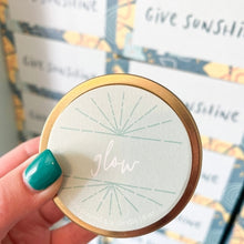 Load image into Gallery viewer, A hand-poured soy candle titled &quot;Glow&quot; from the &quot;Spa&quot; gift box. The set also features a bright &quot;Soak in the Sun&quot; greeting card, a zesty Ray of Sunshine Lemondrops, and an indulgent sugar whip scrub, all designed to create a luxurious and relaxing spa experience.
